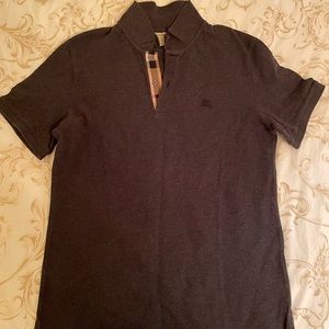 New Condition - Grey Burberry Polo T-shirt L. Always been dry cleaned.